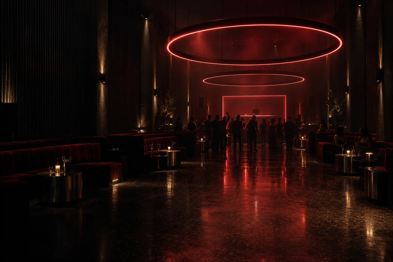 Umbral: una discoteca con aros de luz roja sobre la pista y reservados a los lados.